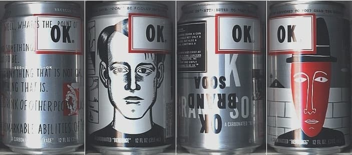 Four grey and silver OK Soda cans side by side, each with a red-bordered OK box and black line drawings of faces